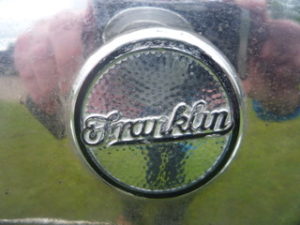 The radiator-mounted Franklin logo on chrome, not nickel as recently used.