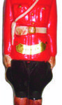 A 1970 figural bottle in the image of a Mountie. He stands 15” tall