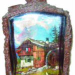 1930s German liquor bottle made to appear as a tree. Inside a scene from the Alps
