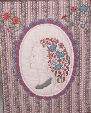 A silhouette of my daughter made into a wall-hanging.